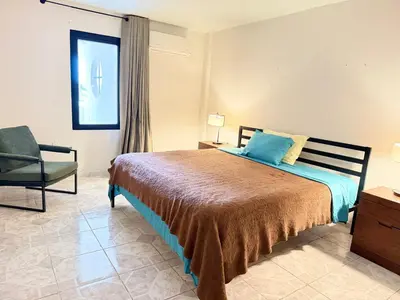 Cama o camas de una habitación en Boca del rio centro y vista al rio