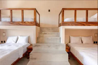 Cama o camas de una habitación en La Barra Resorts Luxury Villas