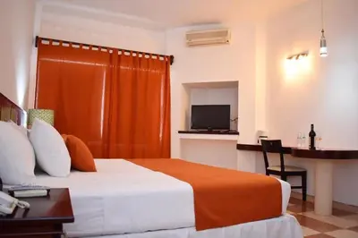 Cama o camas de una habitación en Hotel Vicans