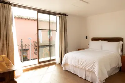 Cama o camas de una habitación en Pasaje Las Rosas