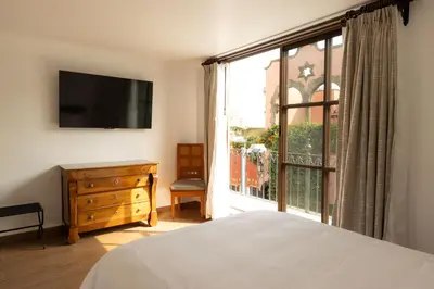 Cama o camas de una habitación en Pasaje Las Rosas
