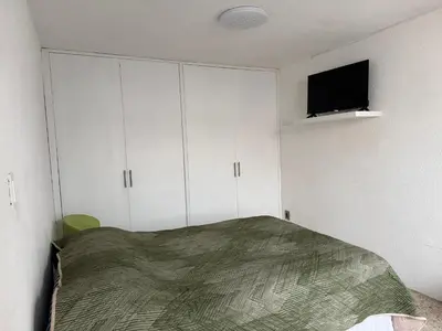 Cama o camas de una habitación en Casa amplia, cómoda y céntrica