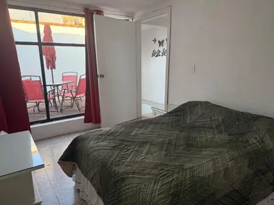 Cama o camas de una habitación en Casa amplia, cómoda y céntrica
