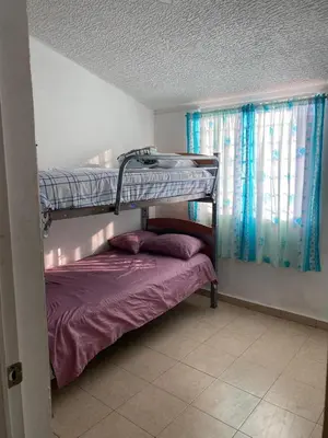 Cama o camas de una habitación en Acapulco Esmeralda