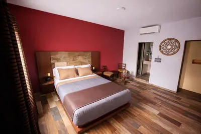 Cama o camas de una habitación en Auto Hotel Express