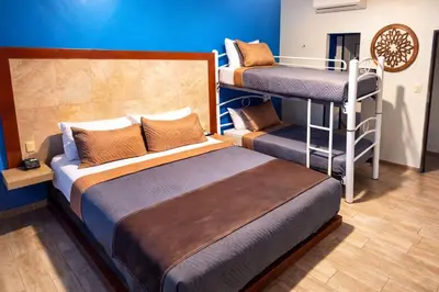 Cama o camas de una habitación en Auto Hotel Express