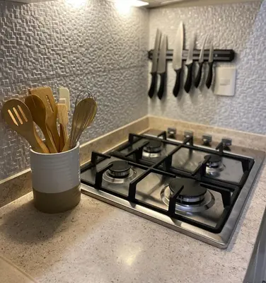 Una cocina o zona de cocina en Casa Lila - Apartment with rooftop & jacuzzi