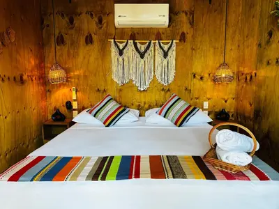 Cama o camas de una habitación en Suites Costa Madéro - Punta Zicatela