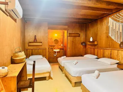 Cama o camas de una habitación en Suites Costa Madéro - Punta Zicatela