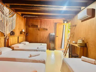Cama o camas de una habitación en Suites Costa Madéro - Punta Zicatela