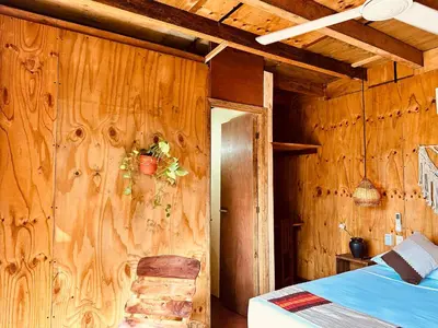 Cama o camas de una habitación en Suites Costa Madéro - Punta Zicatela