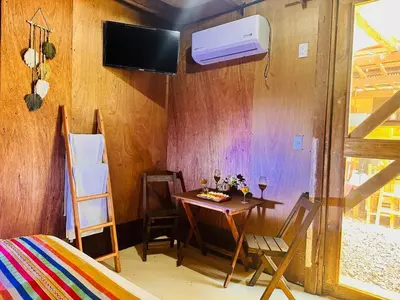 Una televisión o centro de entretenimiento en Suites Costa Madéro - Punta Zicatela