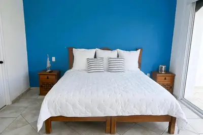 Cama o camas de una habitación en Villas Zamma Acapulco