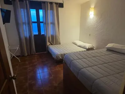 Cama o camas de una habitación en Casa bonita