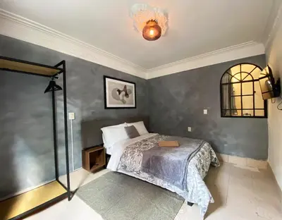 Cama o camas de una habitación en Casa Labardini Suite Colonial en Planta Baja 1
