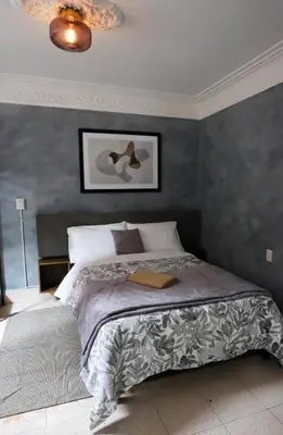 Cama o camas de una habitación en Casa Labardini Suite Colonial en Planta Baja 1