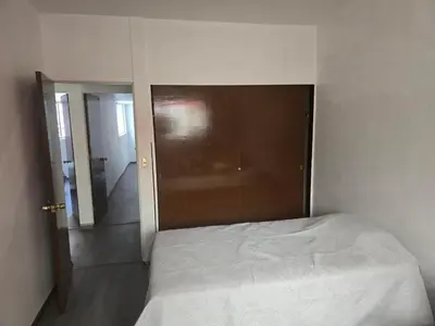 Cama o camas de una habitación en Casa de 1 piso cerca de hospital san alejandro