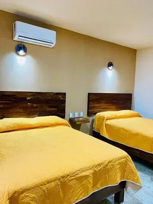 Cama o camas de una habitación en Departamento Santa Cruz Mazunte