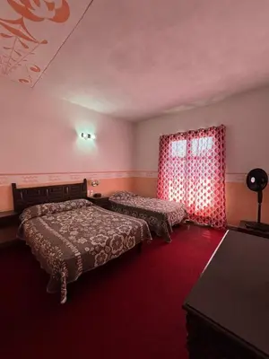 Cama o camas de una habitación en Hotel Mesón del Rey