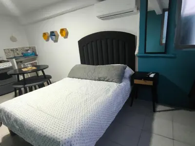 Cama o camas de una habitación en Rooms Veracruz