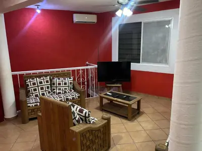 Una televisión o centro de entretenimiento en Casa naranjos