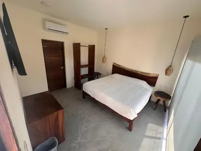 Cama o camas de una habitación en Hotel Almendros Bonfil