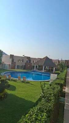 Piscina en o cerca de Hermosa casa familiar con terraza comoda