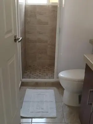 Un baño de Hermosa casa familiar con terraza comoda