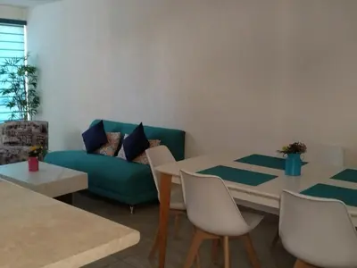 Zona de estar de Hermosa casa familiar con terraza comoda