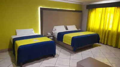 Cama o camas de una habitación en Autohotel Punto de Descanso Cordoba