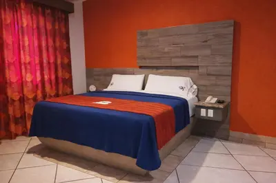 Cama o camas de una habitación en Autohotel Punto de Descanso Cordoba