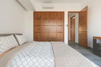 Cama o camas de una habitación en Ocean Front Acapulco - 3BR APT con vista al mar y playa privada