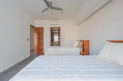 Cama o camas de una habitación en Ocean Front Acapulco - 3BR APT con vista al mar y playa privada