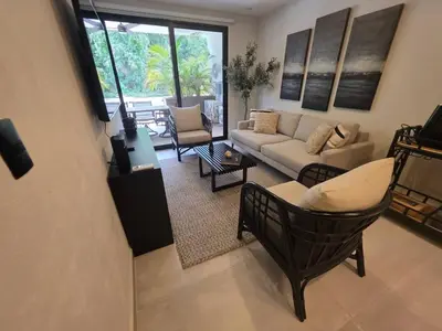 Zona de estar de Condo 2 recámaras a pasos de playa Santa Cruz