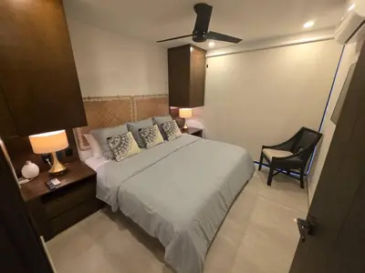 Cama o camas de una habitación en Condo 2 recámaras a pasos de playa Santa Cruz