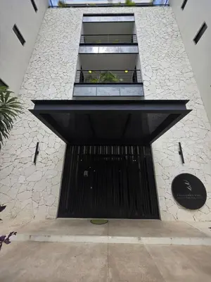 Fachada o entrada de Condo 2 recámaras a pasos de playa Santa Cruz