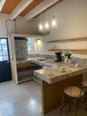Una cocina o zona de cocina en Queso de Luna ALOJAMIENTO