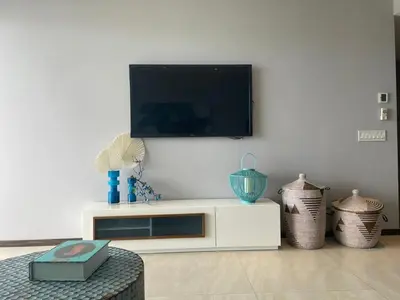 Una televisión o centro de entretenimiento en MF-3-Acapulco Mexico Beach front 3bedroom