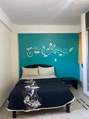 Cama o camas de una habitación en Hotel MERLI