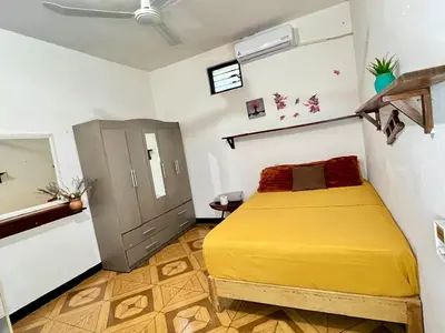 Cama o camas de una habitación en guiba casa en Puerto Escondido