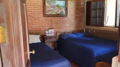 Cama o camas de una habitación en Cabaña Vicani
