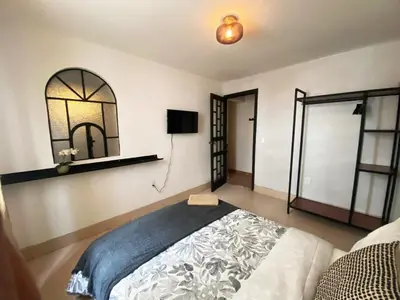 Cama o camas de una habitación en Casa Labardini Colonial Suite with Patio View 2