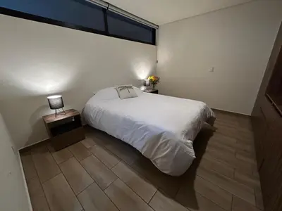 Cama o camas de una habitación en Depto San Felipe Oaxaca