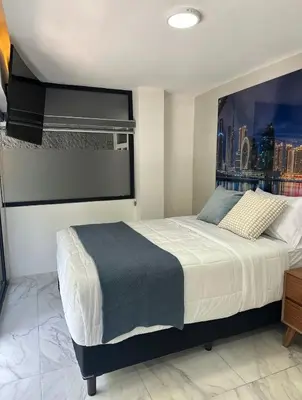 Cama o camas de una habitación en Loft privado con terraza a pasos INP y Perisur