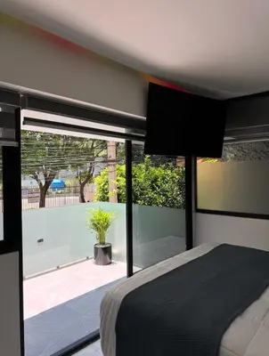 Cama o camas de una habitación en Loft privado con terraza a pasos INP y Perisur