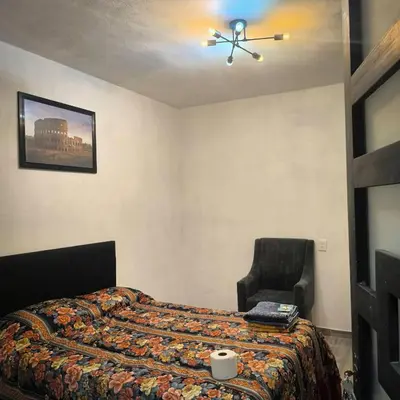 Cama o camas de una habitación en Hospedaje Don Juve