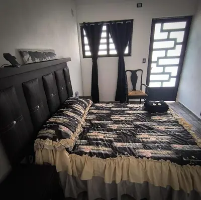 Cama o camas de una habitación en Hospedaje Don Juve