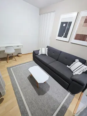 Zona de estar de Cozy Apartamento en Puebla!