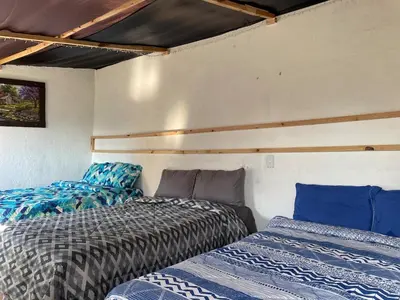 Cama o camas de una habitación en Casa de las montañas