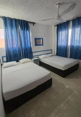 Cama o camas de una habitación en Acapulco LUUM hotel